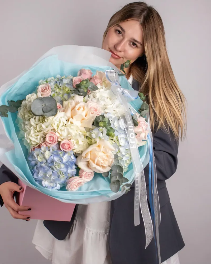 Pastel bouquet with roses, hydrangeas, and eucalyptus