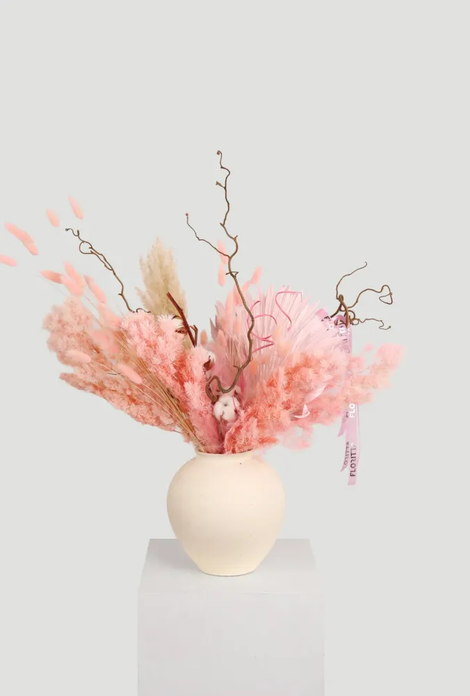 Dried floral arrangement in soft pink & beige tones