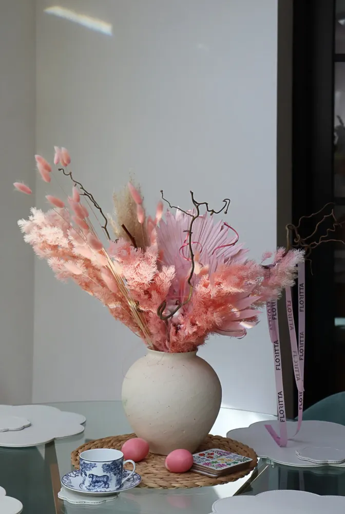 Dried floral arrangement in soft pink & beige tones