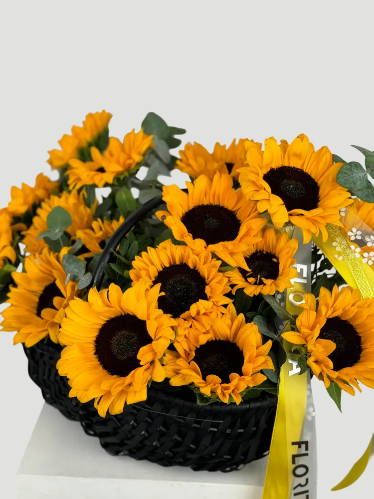 Sunflower basket arrangement with eucalyptus