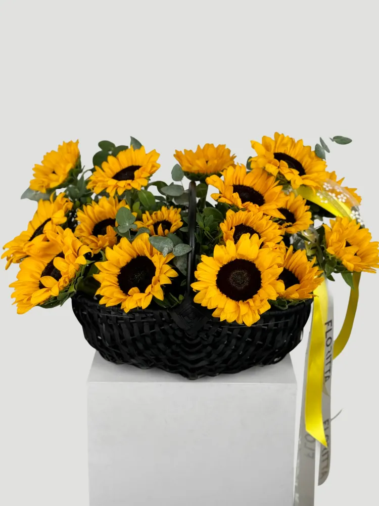 Sunflower basket arrangement with eucalyptus