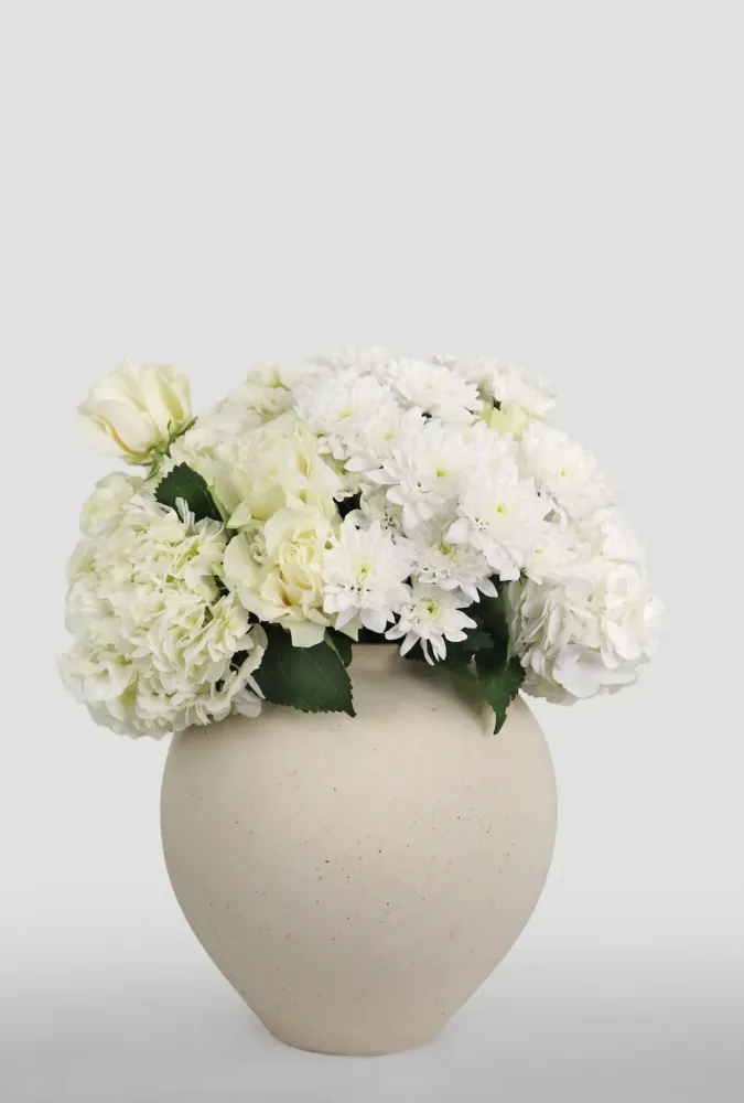 Floral arrangement in white soft neutral tones