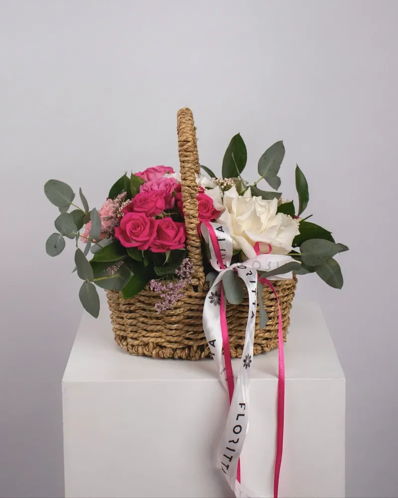 Charming basket of pink and white roses