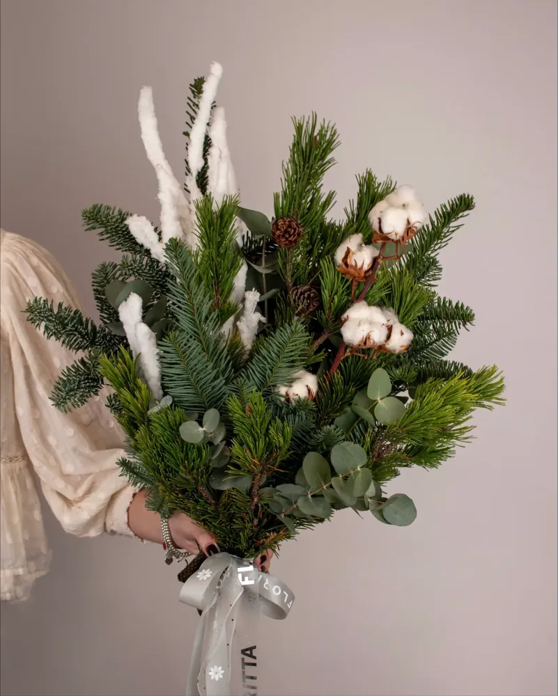 Christmas greenery bouquet with snowy accents