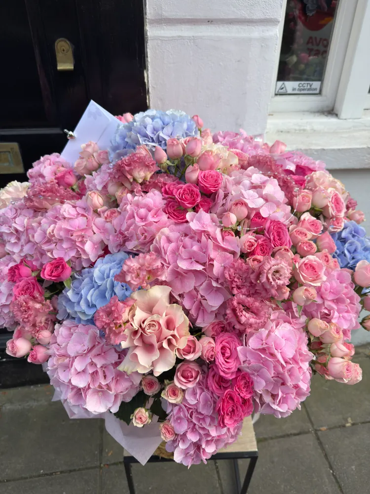 Blossom symphony basket (hydrangeas, eustoma & spray roses)