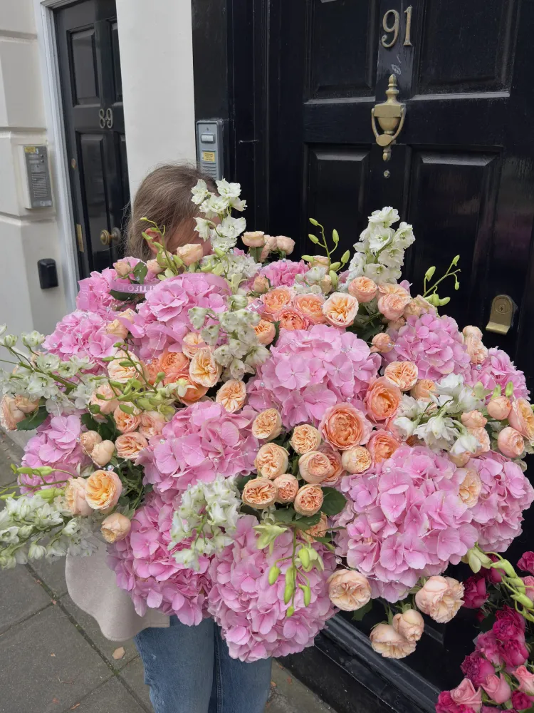 Apricot blush basket (hydrangeas, peony spray roses & delphinium)