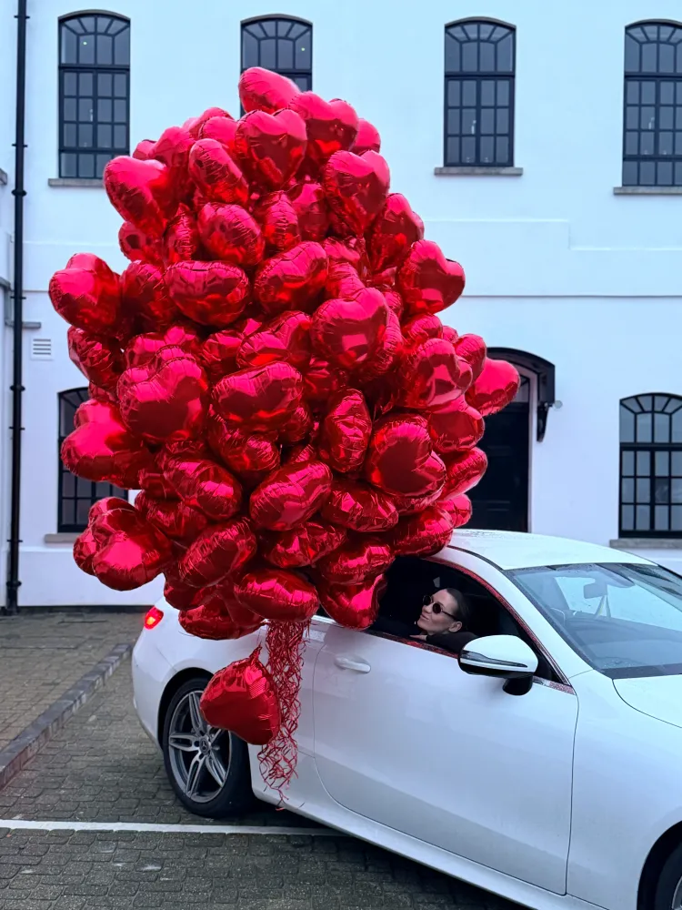 200 fabulous red heart balloons