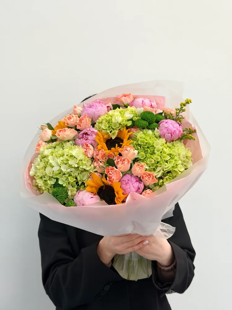 Golden reverie (hydrangeas, spray roses & sunflowers)