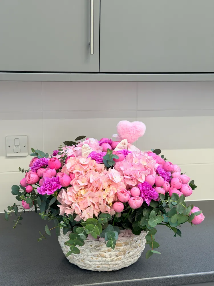 Tender chapter basket (hydrangeas, spray roses & diantus)