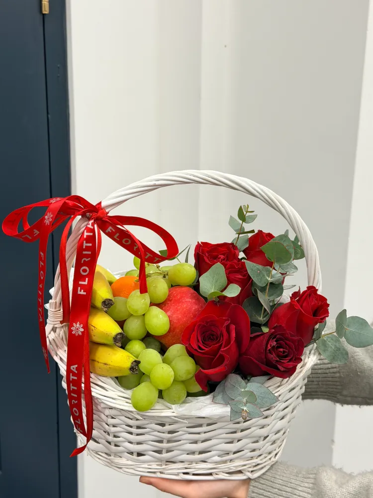 Fruits and roses in the basket