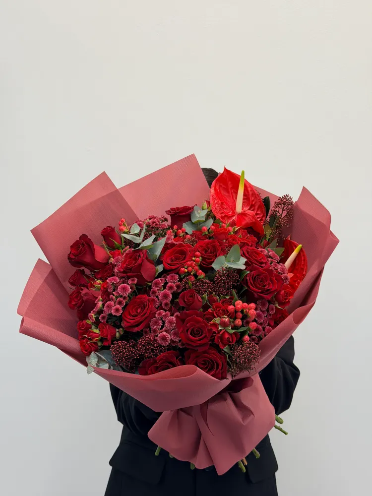Velvet ember mix (roses, anthurium, chrysanthemums & skimmia)