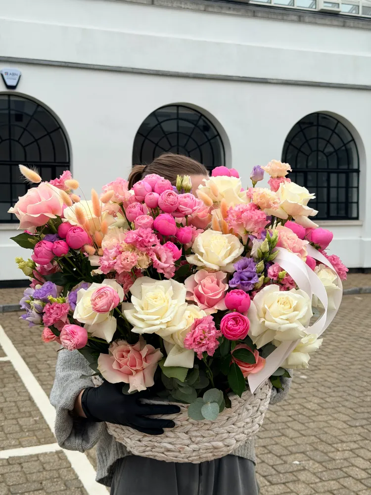 Pastel stillness floral basket (roses, eustomas & spray roses)
