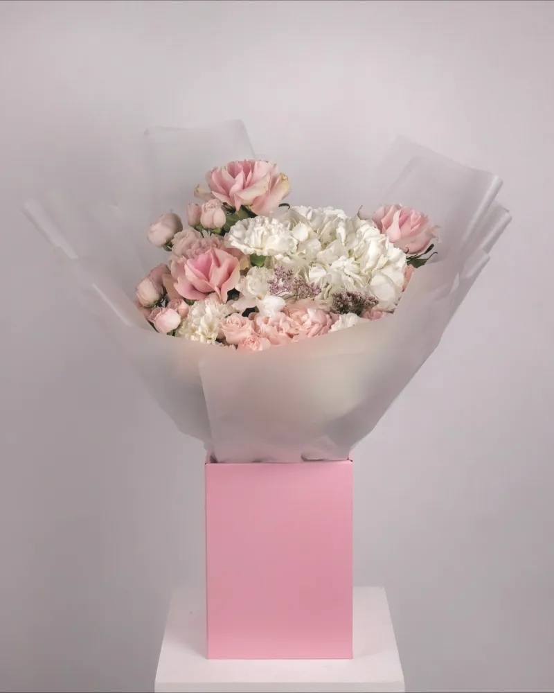 Creamy bouquet with delicate blooms