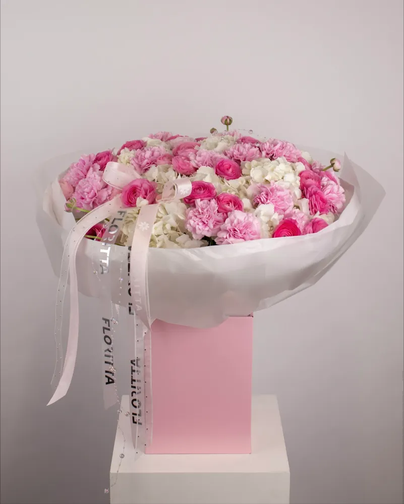 Adoration in bloom (hydrangeas, dianthus & ranunculus)