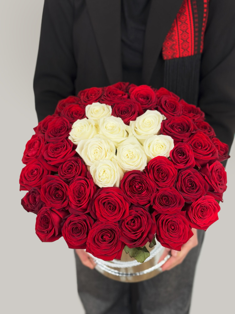 Heart-shaped red and white rose box